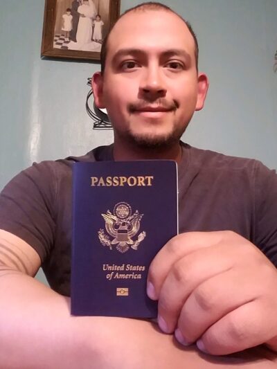 Mark Esqueda with his new passport