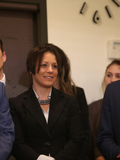 Three of our clients -- Tierre Caldwell, Jennifer Schroeder and Elizer Darris -- share a light moment while watching our Let People Vote Press Conference