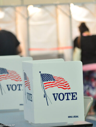 Voting booths are kept socially distant at a New Hampshire polling site.