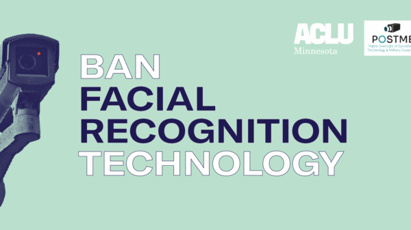 An image of a surveillance camera looms in the background.