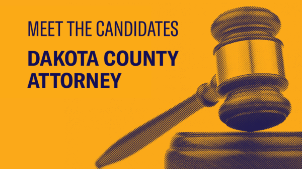 To the right, an image of a large gavel. To the left, text that reads: Meet the Candidates, Dakota County Attorney.