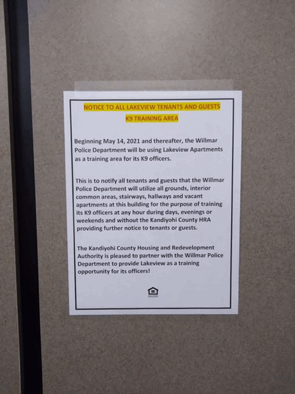 A sign posted informs residents about the K-9 training partnership.