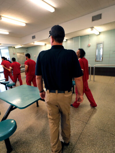 Immigration detainees leave the cafeteria under the watch of guards during a media tour at the Winn Correctional Center in Winnfield, La., in this Thursday, Sept. 26, 2019 file photo.
