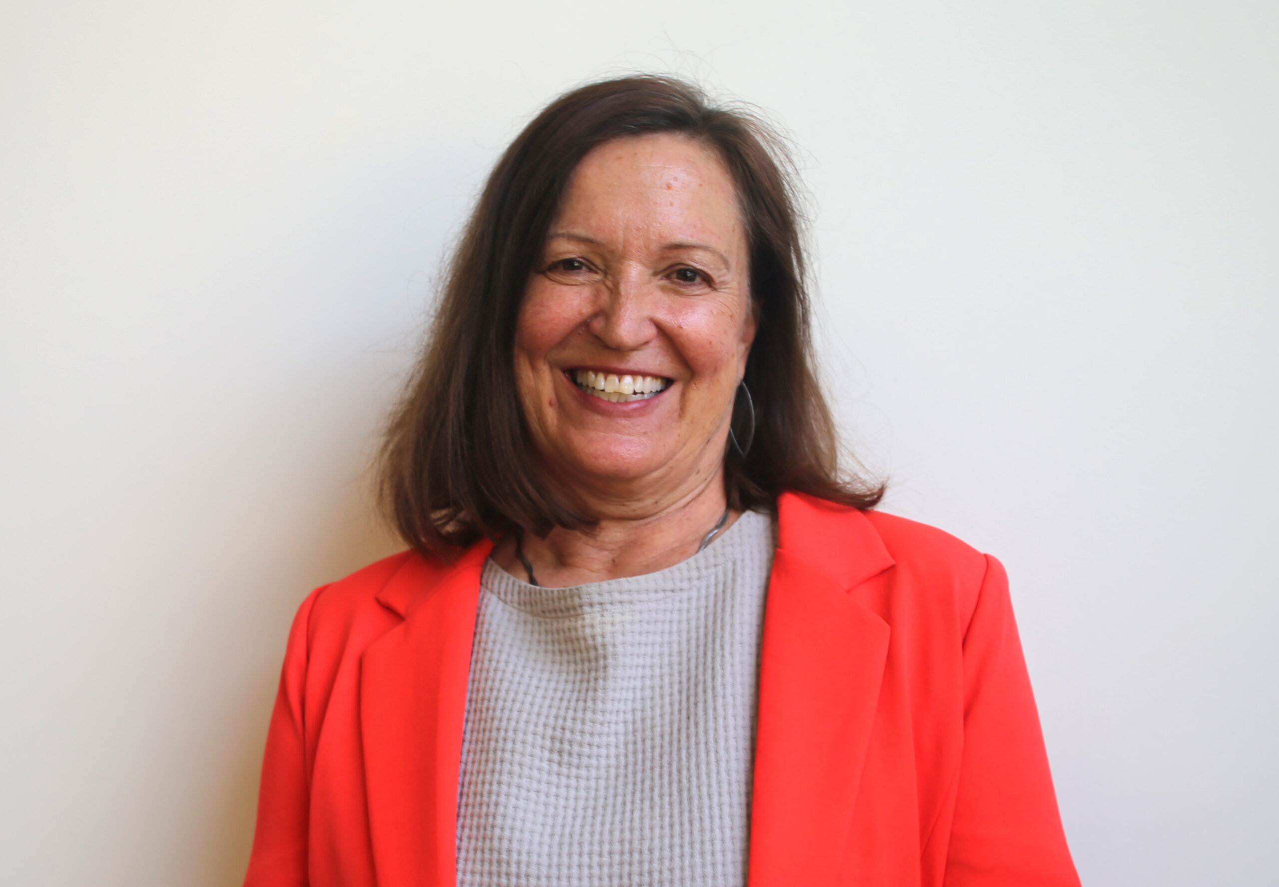 Headshot of Cindy Hall-Duran against a white wall