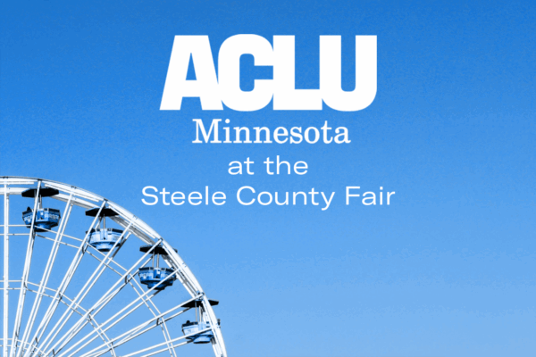 Blue ferris wheel with text reading "ACLU Minnesota at the Steele County Fair"