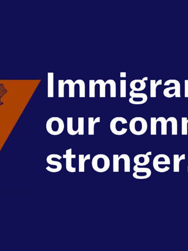 A yellow sign that says "immigrants are welcome here" layered over an orange map of the U.S., which is on a dark blue background. Next to the graphics is white text that says, "Immigrants make our communities stronger."