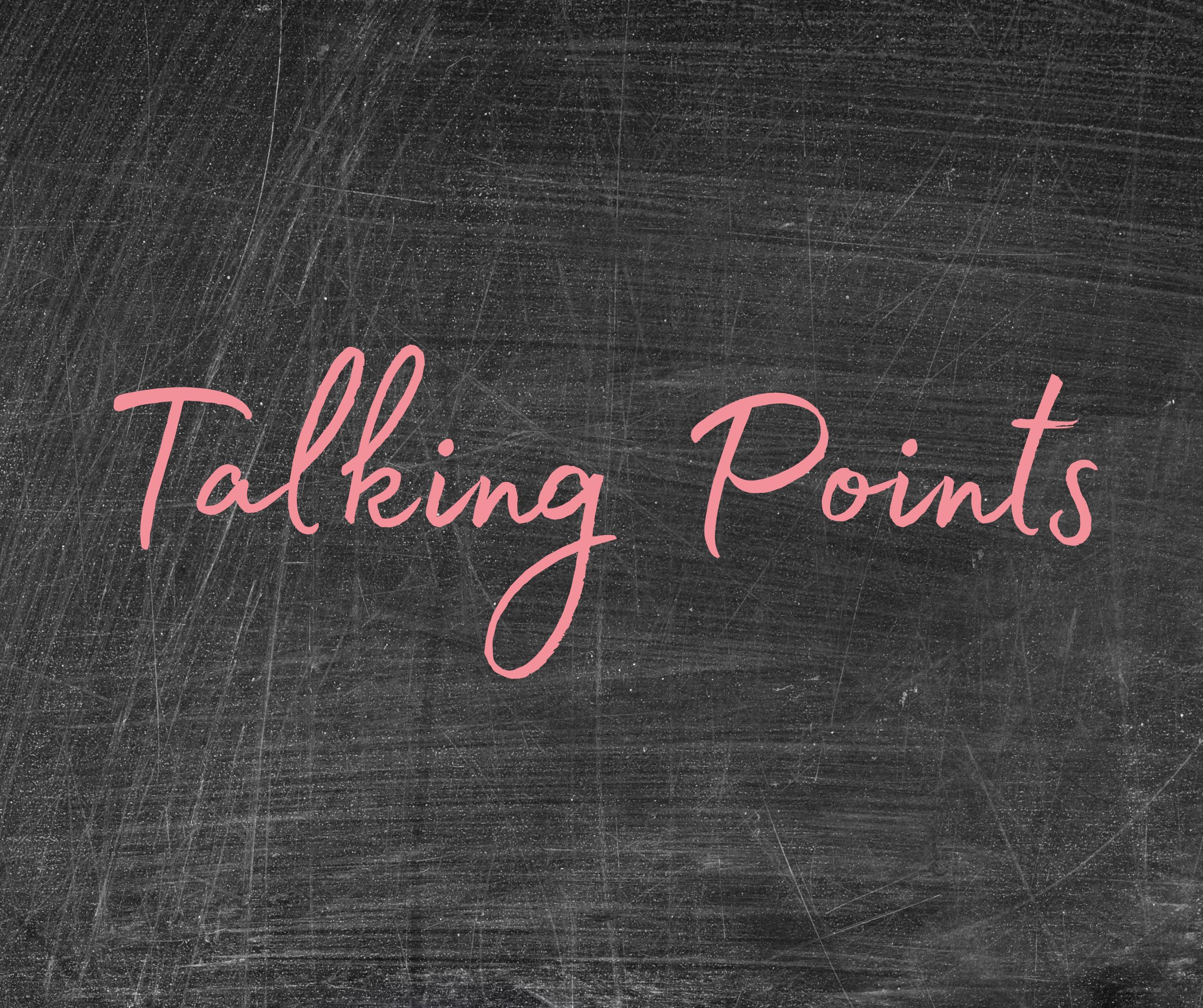 Photo of a blackboard with colorful chalk along the bottom part of its wood frame. On the board is written "talking points," in pink chalk.