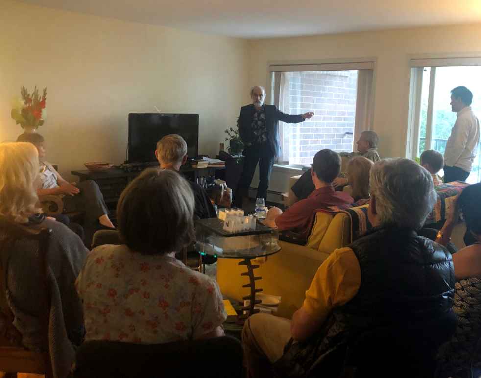 Privacy specialist Bruce Schneier delivers a talk to a small crowd, who listen intently