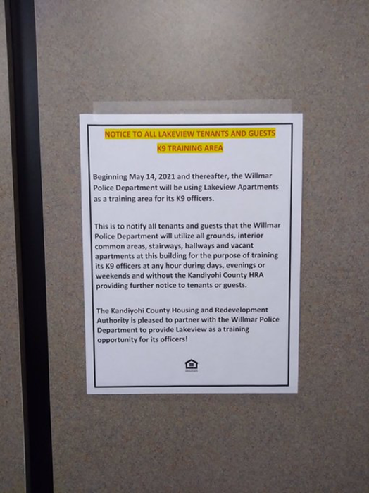 A sign posted informs residents about the K-9 training partnership.