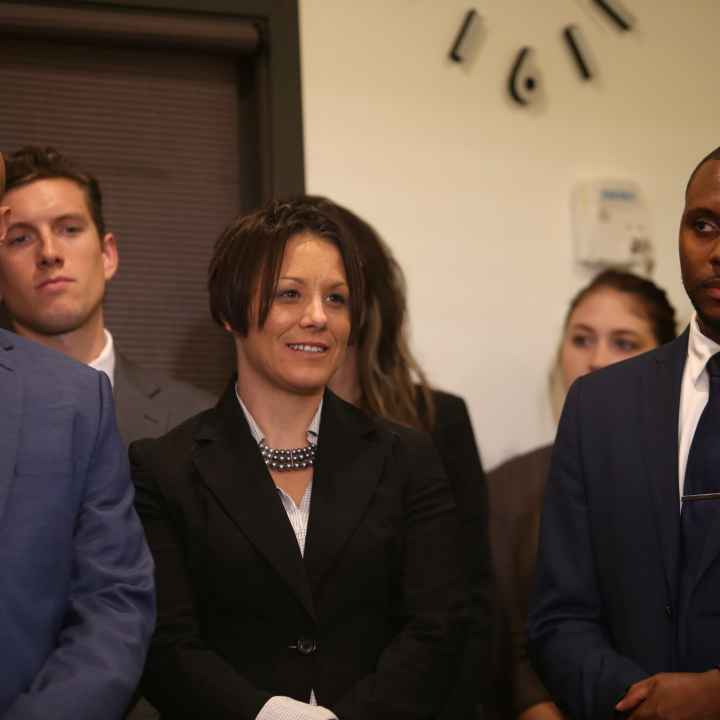 Three of our clients -- Tierre Caldwell, Jennifer Schroeder and Elizer Darris -- share a light moment while watching our Let People Vote Press Conference