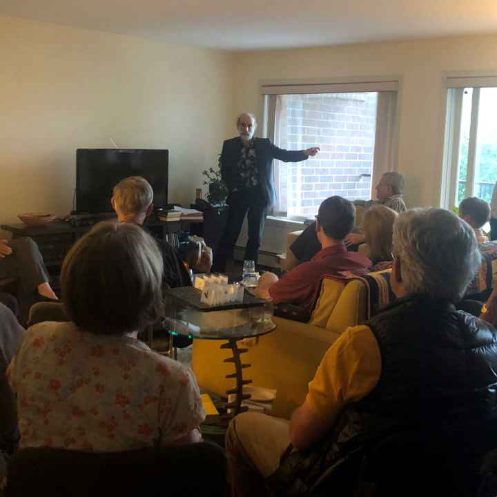 Privacy specialist Bruce Schneier delivers a talk to a small crowd, who listen intently