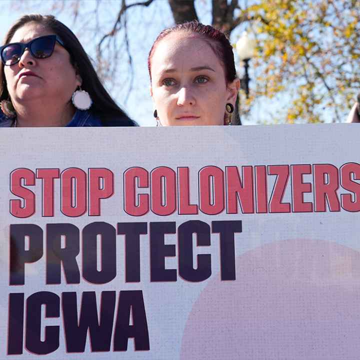 Demonstrators stand outside the US Supreme Court to hear decisions over Indian Child Welfare Act.